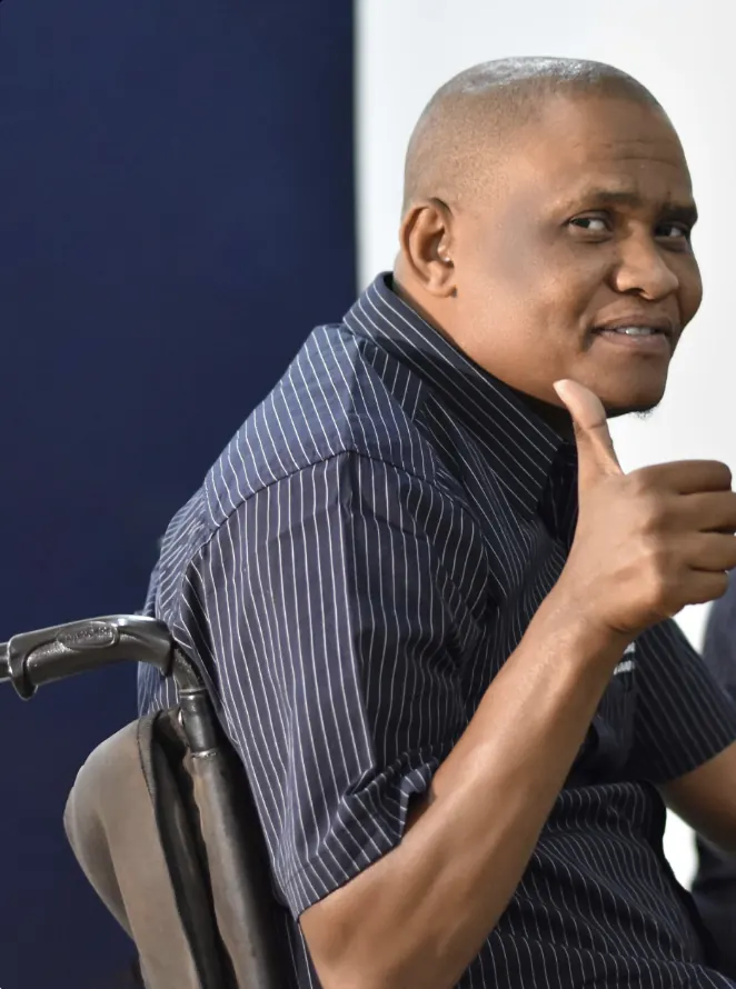 JIMBU learner giving a thumbs up during a training session